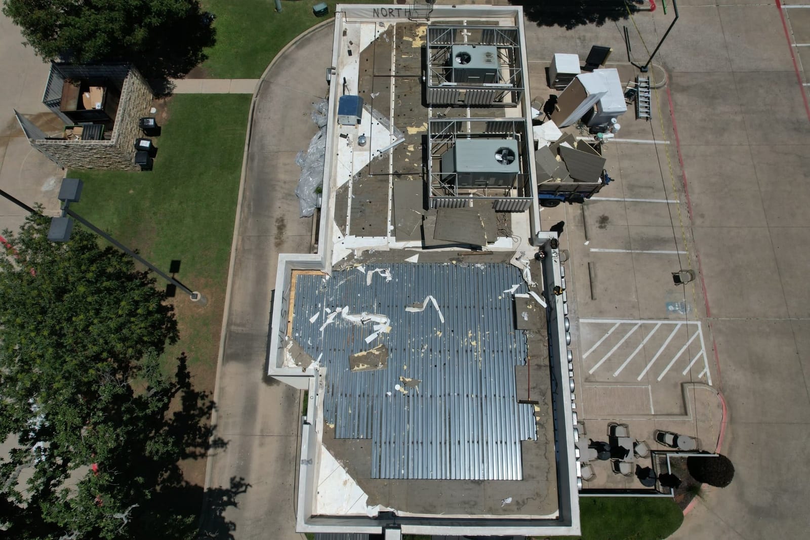 Commercial roof during tear-off, a Select Roofing job