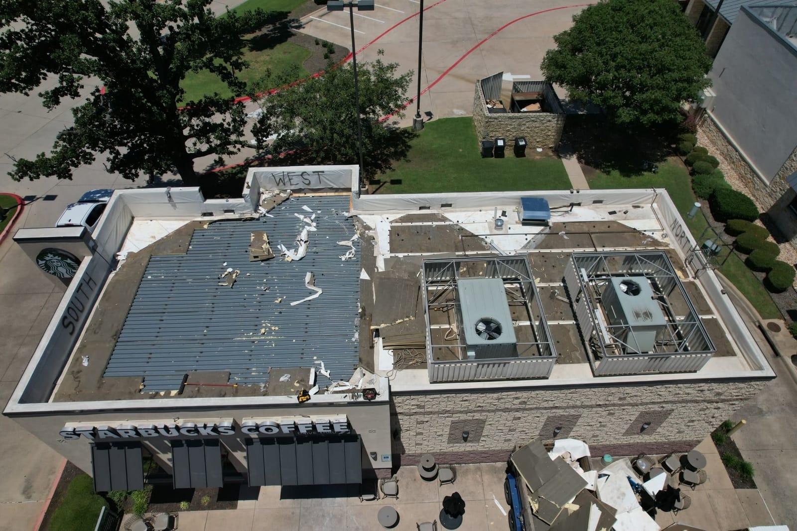 Commercial roof during tear-off, a Select Roofing job