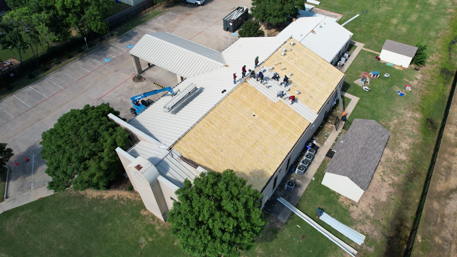 Commercial roof during tear-off, a Select Roofing job