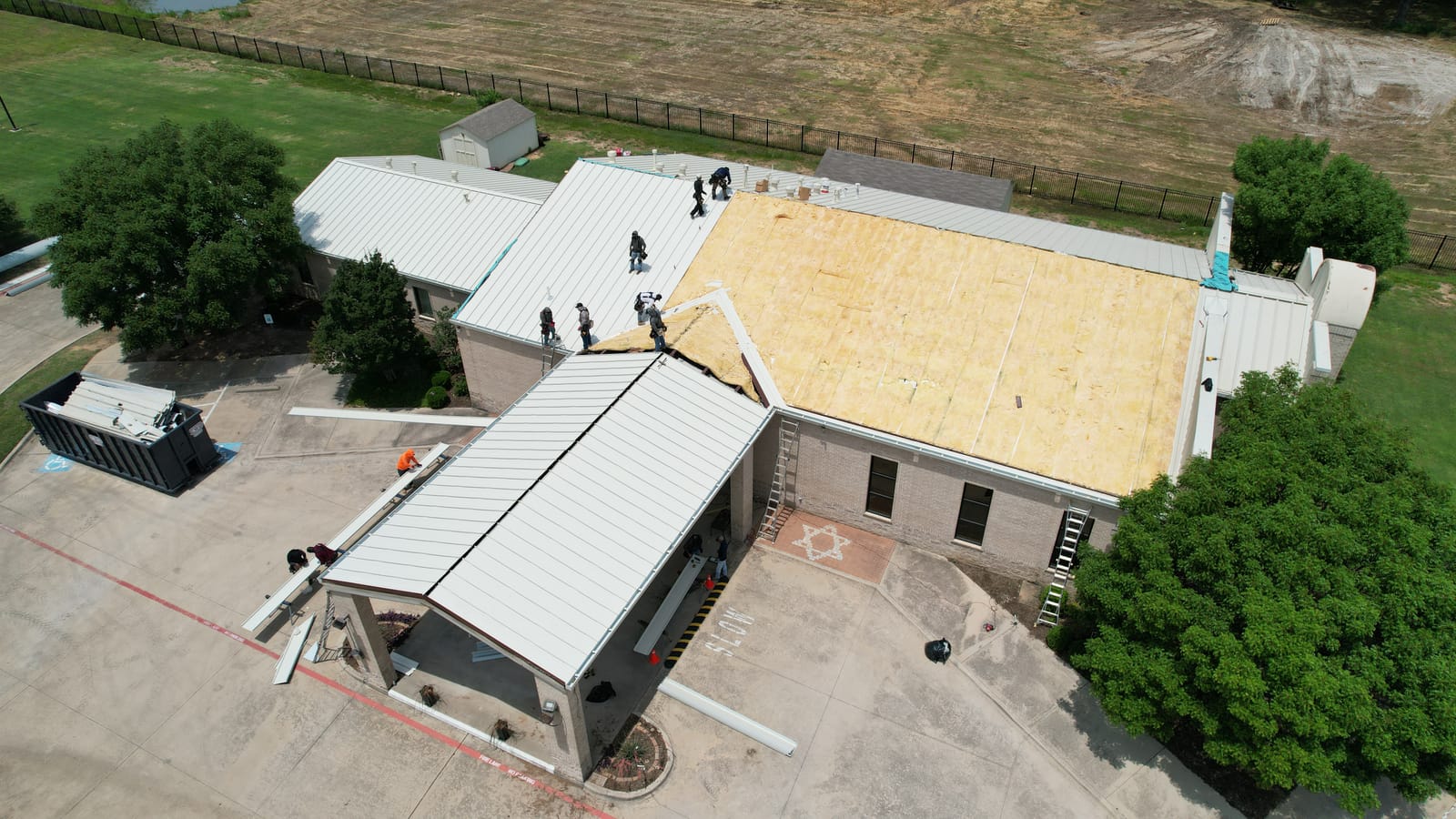 Commercial roof during tear-off, a Select Roofing job