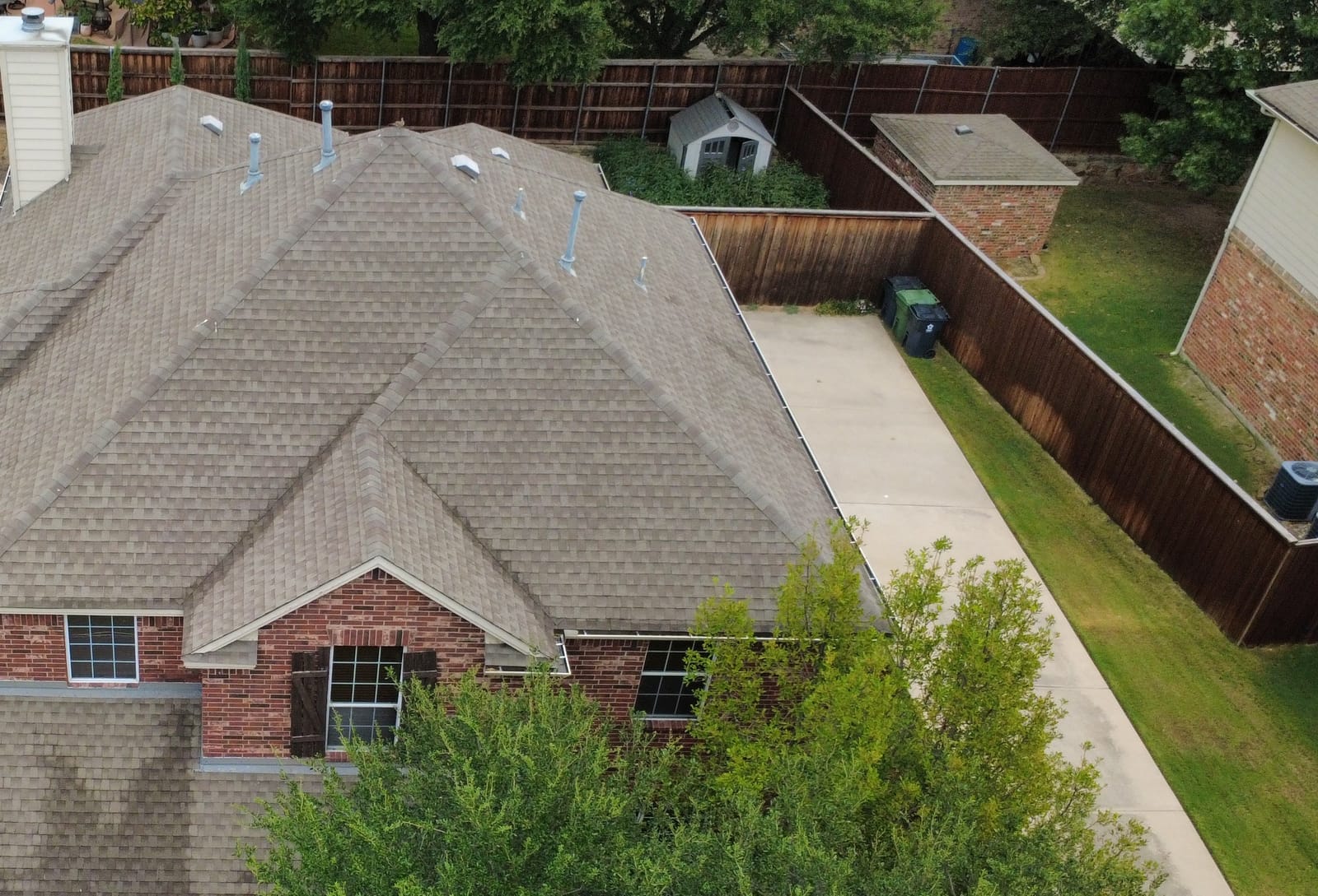 Aerial view of a completed residential roof replacement
